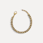 Pulseira Lifeaskika em aço inoxidável com discos bicolores dourados e prateados e fecho ajustável.